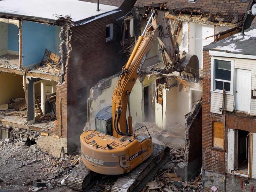 excavator house demolition